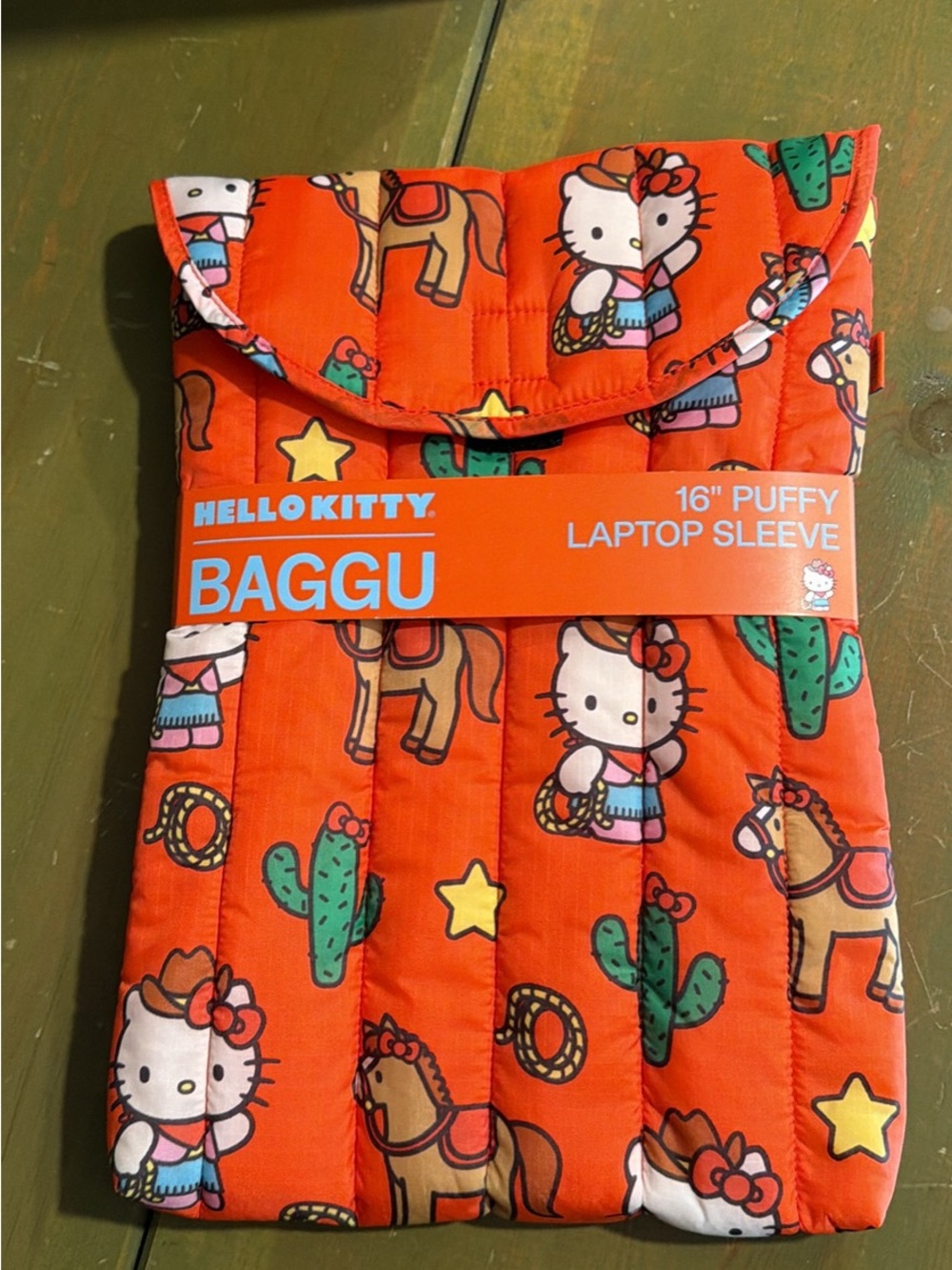 BAGGU Hello Kitty Orange Quilted Puffy Laptop Sleeve with Cactus & Horse Print